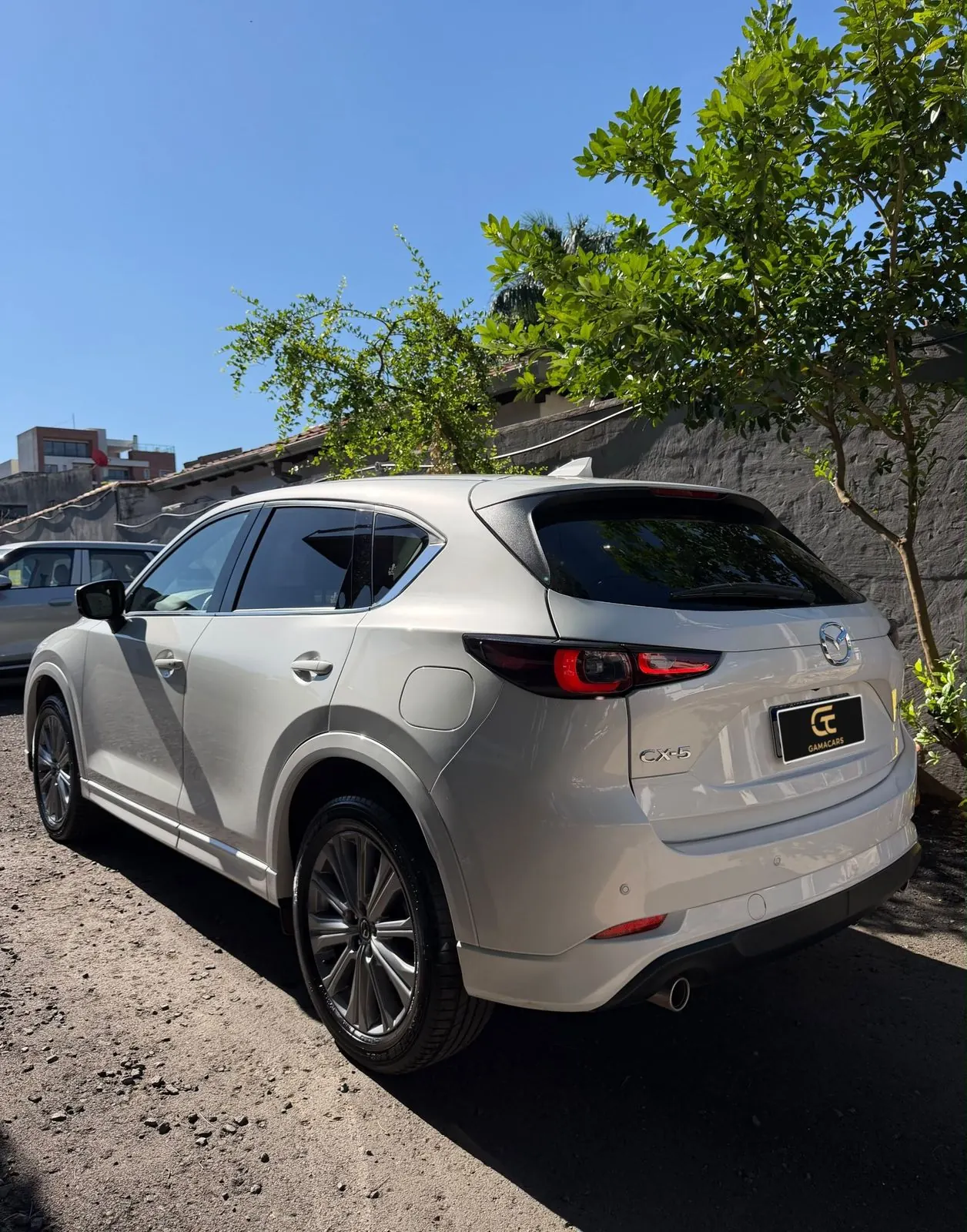 Mazda CX-5 Limited blanco, trasera lateral